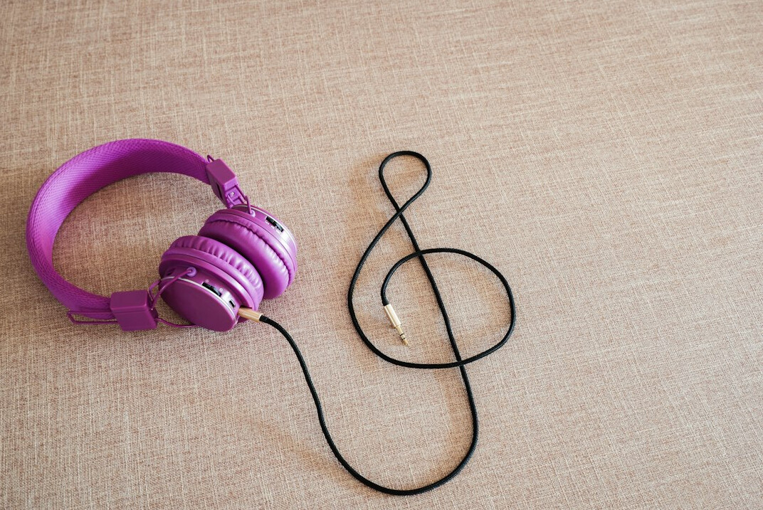 Podcast microphone and headphones in a studio