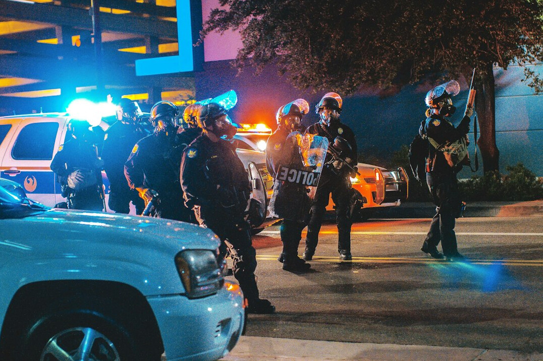 security team arresting suspect