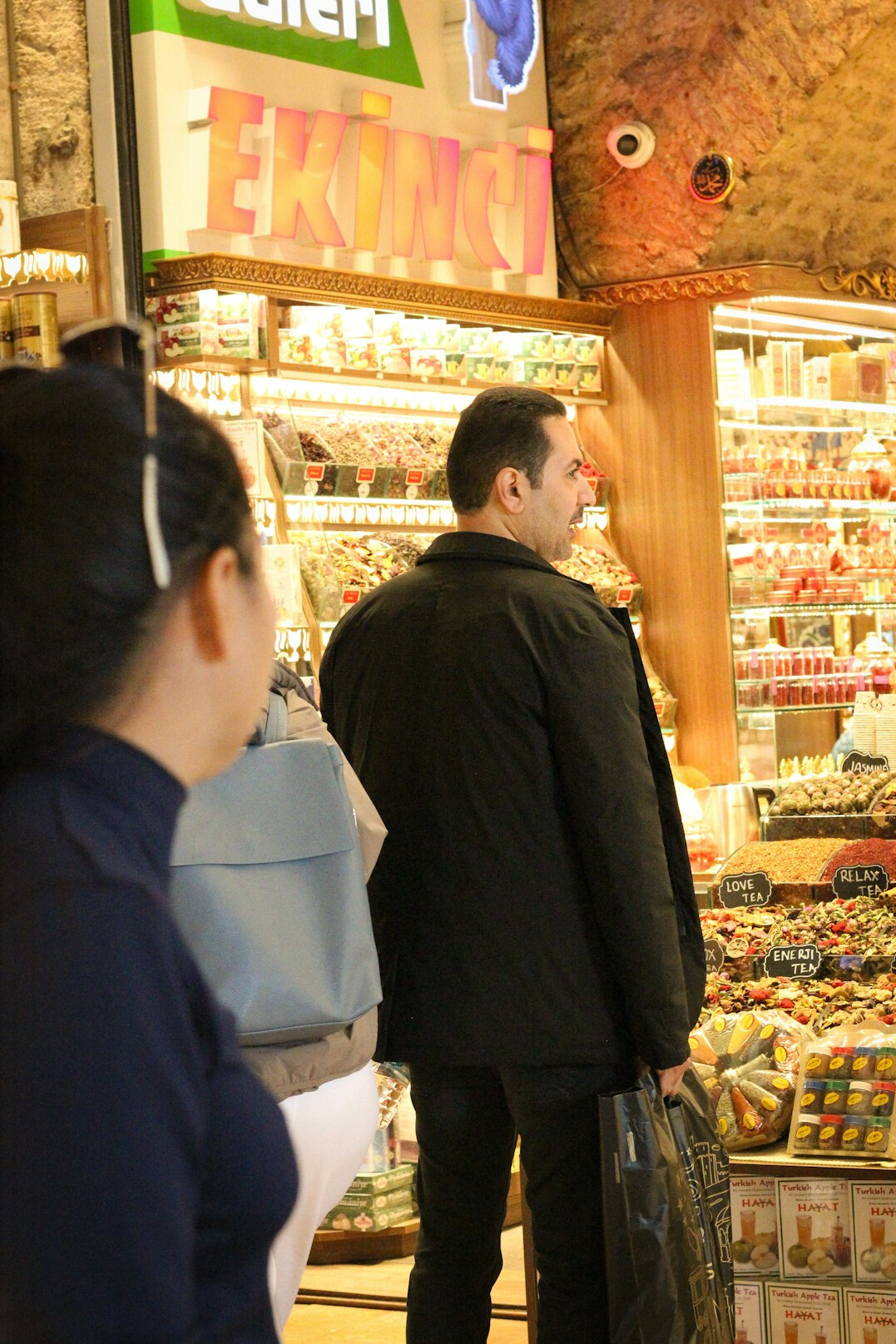 detective talking to store manager
